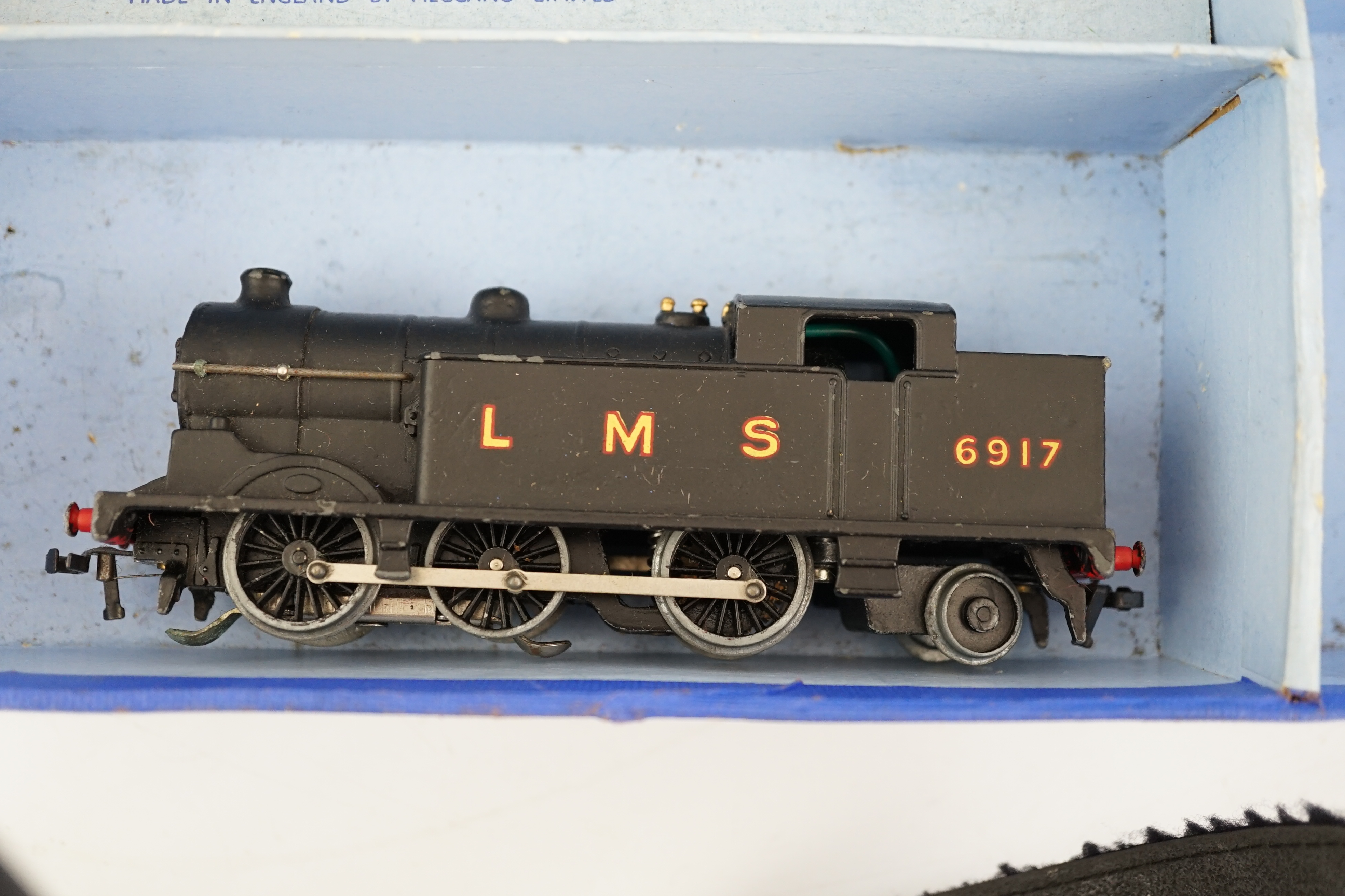 A collection of Hornby Dublo railway for 3-rail running, including; a boxed EDG7 Tank Goods Train set comprising an LMS Class N2 0-6-2 locomotive, 6917, freight wagons and track sections